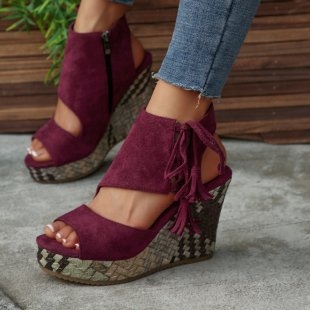 Határokon átnyúló, plus size európai és amerikai ékszandálok női 2025 tavaszi/nyári bojtos, magas sarkú, halszájjal díszített, vastag talpú női cipők platformcipők