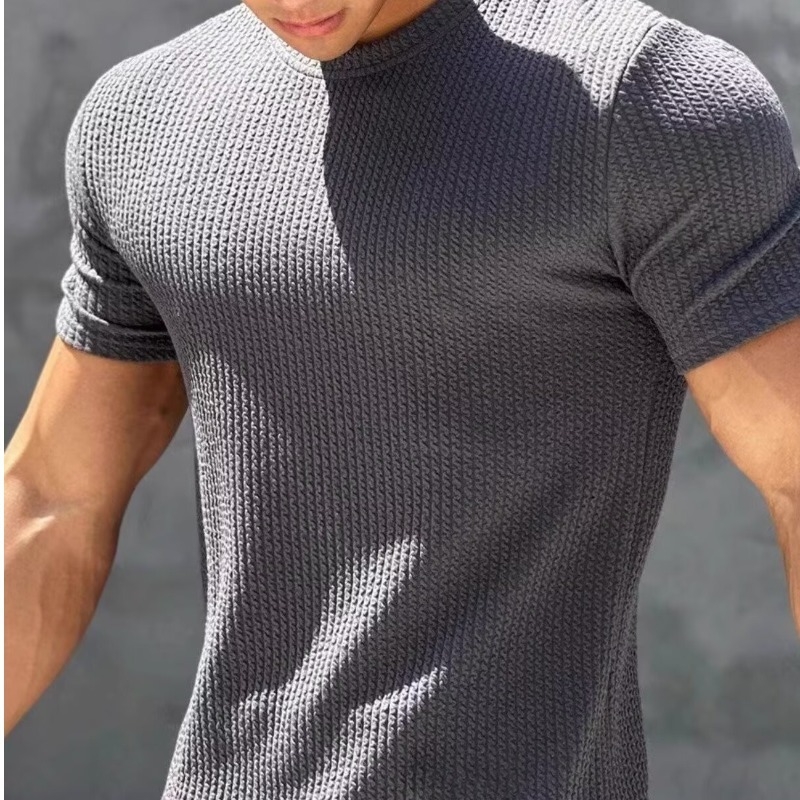 Férfi rövid ujjú, rugalmas, gyorsan száradó, amerikai stílusú futóruha, edzőruha, kosárlabda, fitneszruha, rövid ujjú, kerek nyakú, testhezálló felső.