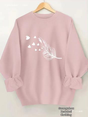 Női lezser, kerek nyakú, kapucnis pulóver geometrikus mintával - puha