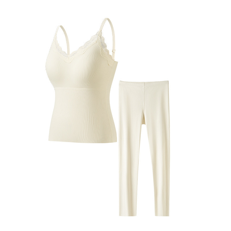 Šilta moteriška vientisa besiūlė apatinė liemenė su krūtinės įdėklu. Rudens ir žiemos lengvi, push-up stiliaus, ploni apatiniai marškinėliai.