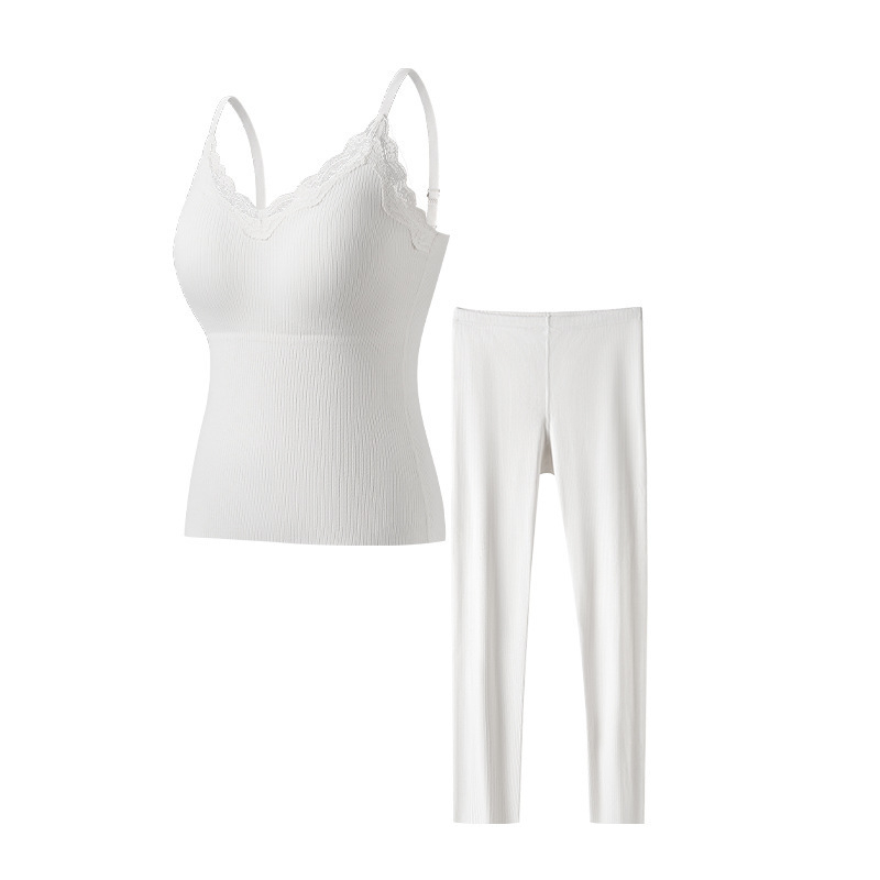 Šilta moteriška vientisa besiūlė apatinė liemenė su krūtinės įdėklu. Rudens ir žiemos lengvi, push-up stiliaus, ploni apatiniai marškinėliai.