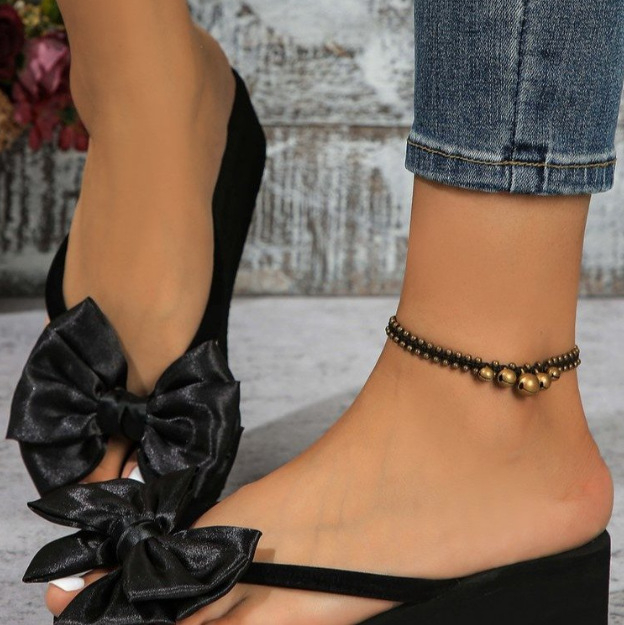 Határokon átnyúló 2024-es külkereskedelmi új nyári éksarkú, lábujj nélküli, muffin vastag talpú, európai és amerikai színű, gyémánt pillangós női szandál