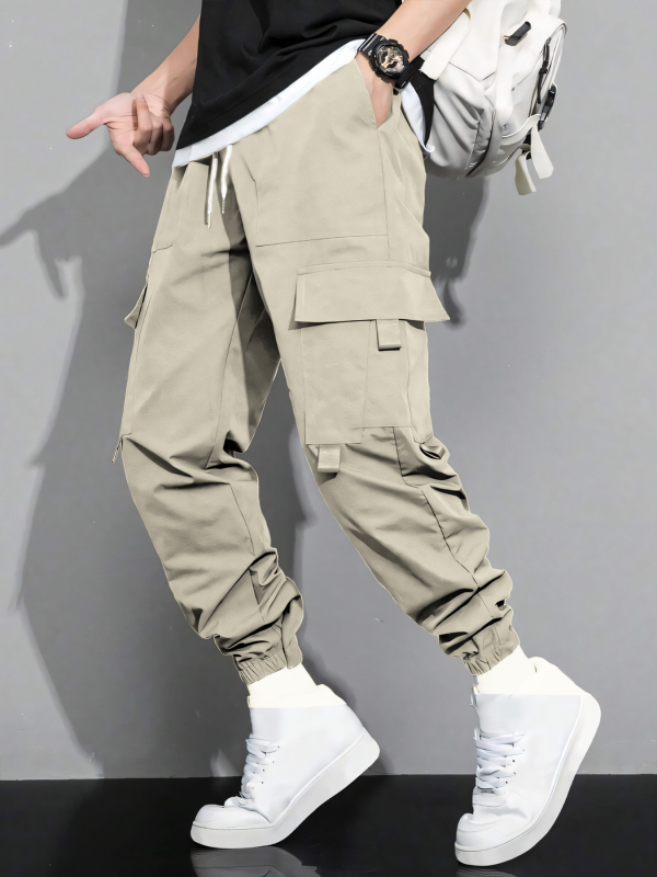 Pánske jarné a jesenné nové jednofarebné jednoduché americké štýlové mládežnícke voľné pracovné nohavice s viacerými vreckami