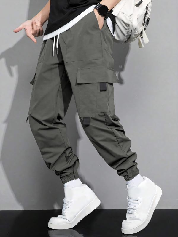 Pánske jarné a jesenné nové jednofarebné jednoduché americké štýlové mládežnícke voľné pracovné nohavice s viacerými vreckami