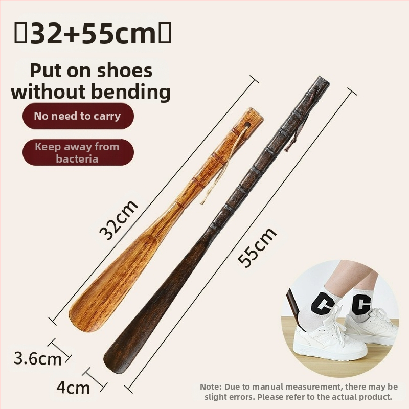 Täispuidust kingatõmmits majapidamises, pika käepidemega, eakad rasedad naised, mitte painutatud kingatõmmits, kulunud kinga artefakt, puidust kingatõmmits, säästab aega