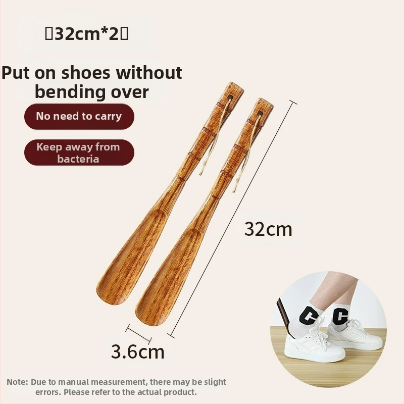 Täispuidust kingatõmmits majapidamises, pika käepidemega, eakad rasedad naised, mitte painutatud kingatõmmits, kulunud kinga artefakt, puidust kingatõmmits, säästab aega