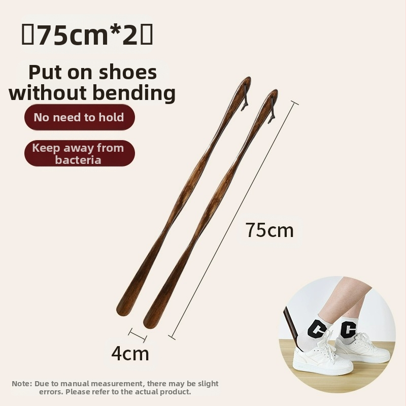 Täispuidust kingatõmmits majapidamises, pika käepidemega, eakad rasedad naised, mitte painutatud kingatõmmits, kulunud kinga artefakt, puidust kingatõmmits, säästab aega