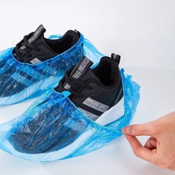 Mājsaimniecības putekļus necaurlaidīgs plastmasas apavu pārvalks Unisex ūdensnecaurlaidīgs apavu pārvalks Jauns materiāls PE pēdu pārvalks Sabiezināts vienreizlietojamais apavu pārvalks