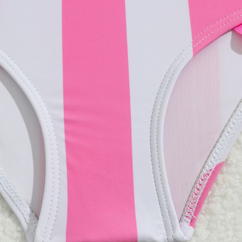 Tüdrukute roosa triibuline ükssarvikuga ühes tükis ujumistrikoo lendava äärega