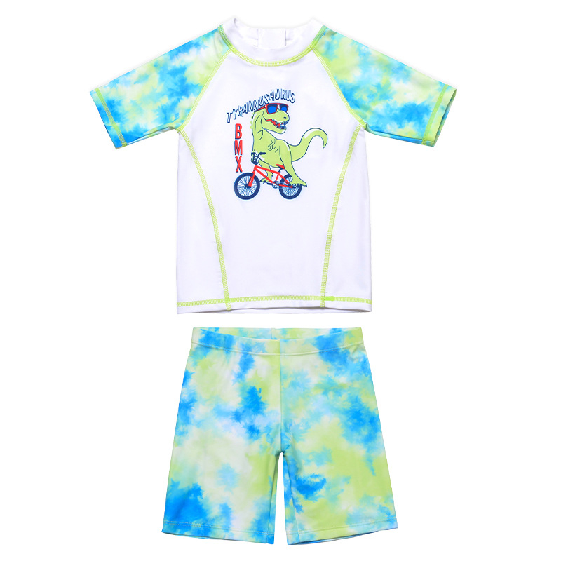 Piiriülesed koomiksi dinosauruse jalgrattapoiste lühikeste varrukatega püksid, päikesekaitsekreemiga hingav lõhenenud värviline ujumistrikoo