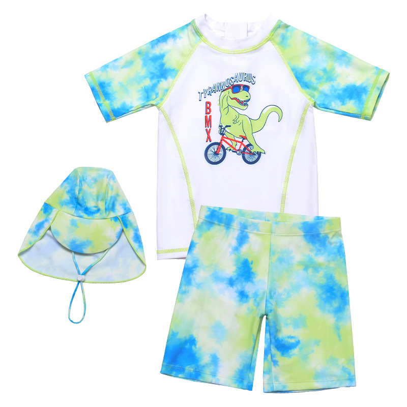 Piiriülesed koomiksi dinosauruse jalgrattapoiste lühikeste varrukatega püksid, päikesekaitsekreemiga hingav lõhenenud värviline ujumistrikoo