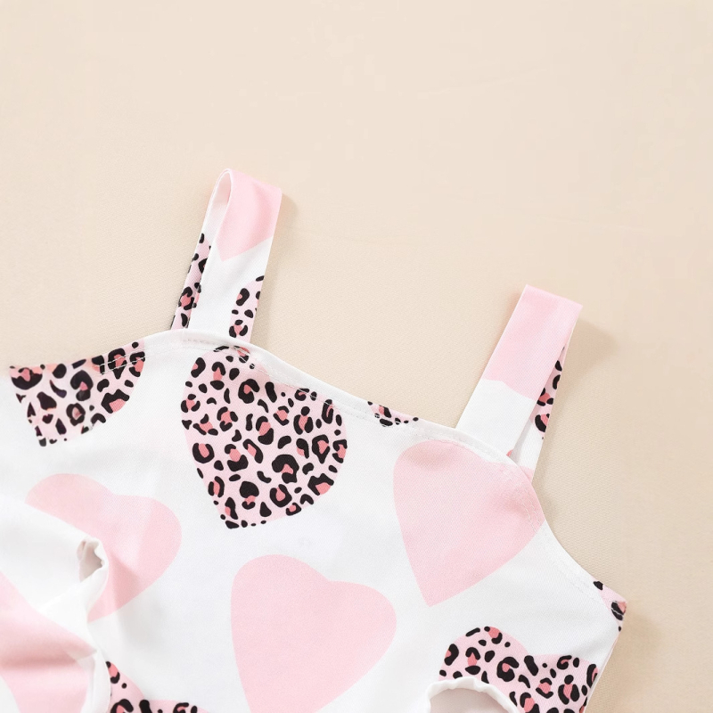 Tüdrukute suvine mereäärne ühes tükis ujumistrikoo, roosa armastuse leopardi mustriga vöökohalt kitsas kolmnurkne ujumistrikoo.