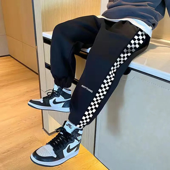 Lasteriided Poiste sügispüksid 2023 Uued Korea stiilis kevad- ja sügispüksid, keskmised ja suured laste malelaua mustriga, trendikad sügispüksid