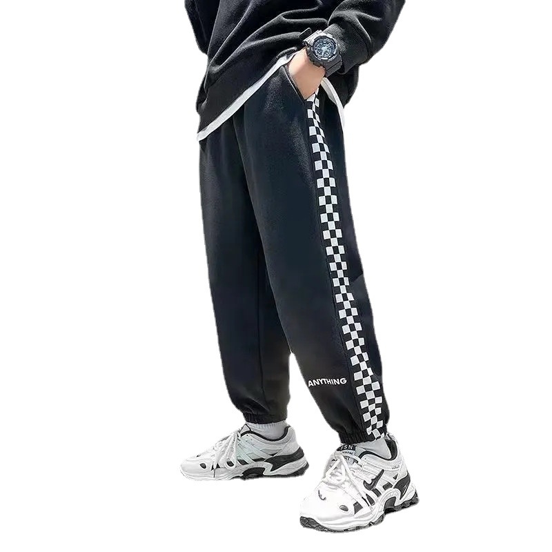 Lasteriided Poiste sügispüksid 2023 Uued Korea stiilis kevad- ja sügispüksid, keskmised ja suured laste malelaua mustriga, trendikad sügispüksid