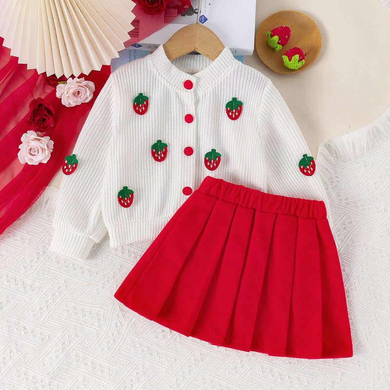 Jesenný pletený kardigan s výbuchmi zahraničného obchodu pre nové dievčatá s jahodovou výšivkou a červenou krátkou skladanou sukňou, dvojdielna súprava