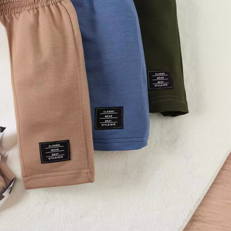 INS3-osalised poiste moekad vabaaja ühevärvilised kootud kampsunid, kirjaga Zhang Zi, dekoratiivsed lühikesed püksid