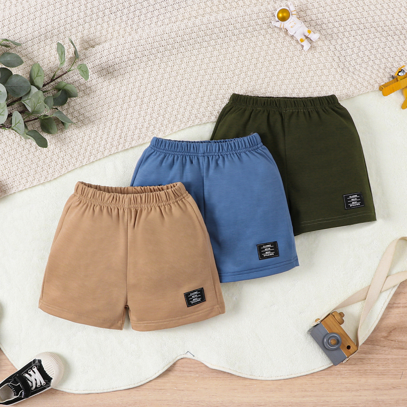 INS3-osalised poiste moekad vabaaja ühevärvilised kootud kampsunid, kirjaga Zhang Zi, dekoratiivsed lühikesed püksid