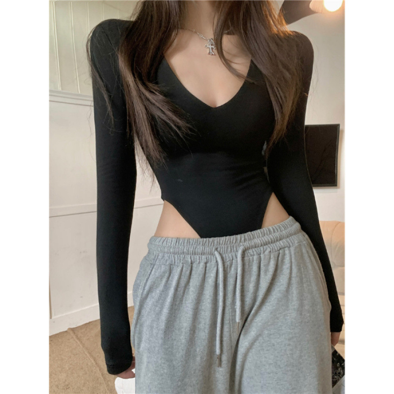 Dámsky overal s dlhým rukávom a výstrihom do V v americkom štýle, slim fit, strečový pás, vnútorná spodná košeľa, visiace tričko v rozkroku