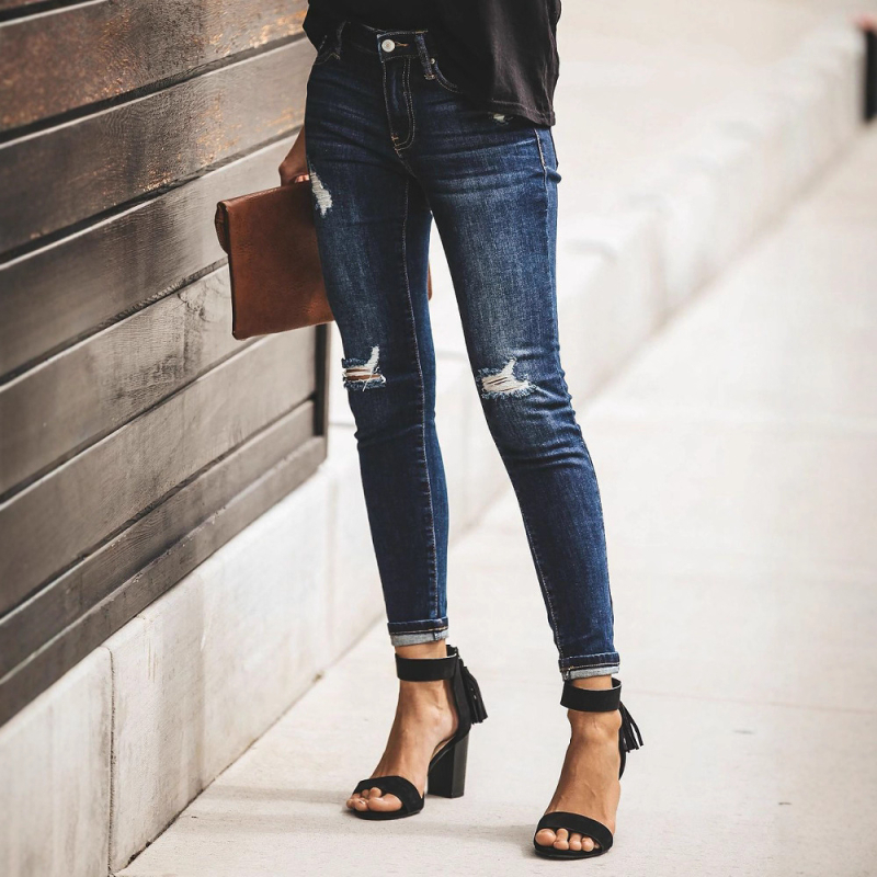 Európske a americké cezhraničné jesenné a zimné nové dámske oblečenie s dierami, módne úzke džínsy a nohavice pre ženy