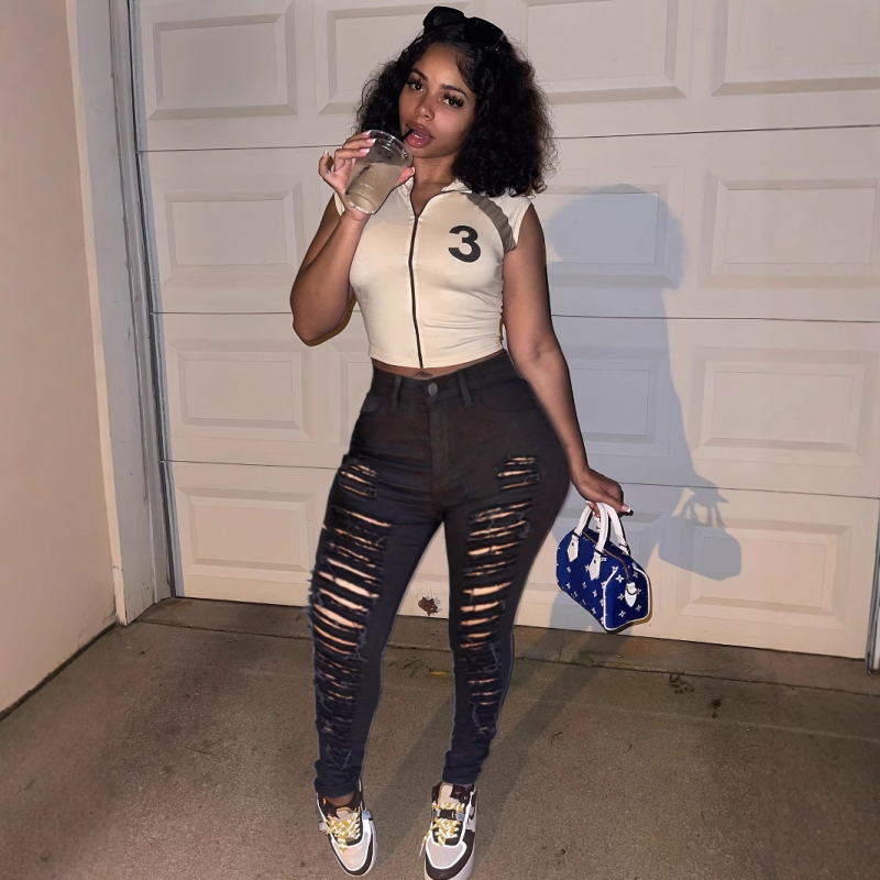 AliExpress Európske a americké ležérne módne univerzálne veľké roztrhané džínsy Dámske trendy personalizované roztrhané elastické legíny pre žobrákov