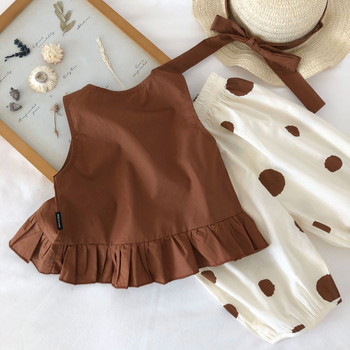 Κοριτσίστικο κοστούμι 2025 Καλοκαίρι Νέο Παιδικό Κορεάτικο Στυλ Αμάνικο Πουκάμισο Κούκλας με Πόλο και Φαρδιά Πόδια Σετ Δύο Τεμαχίων για Δωρεάν Καπέλο