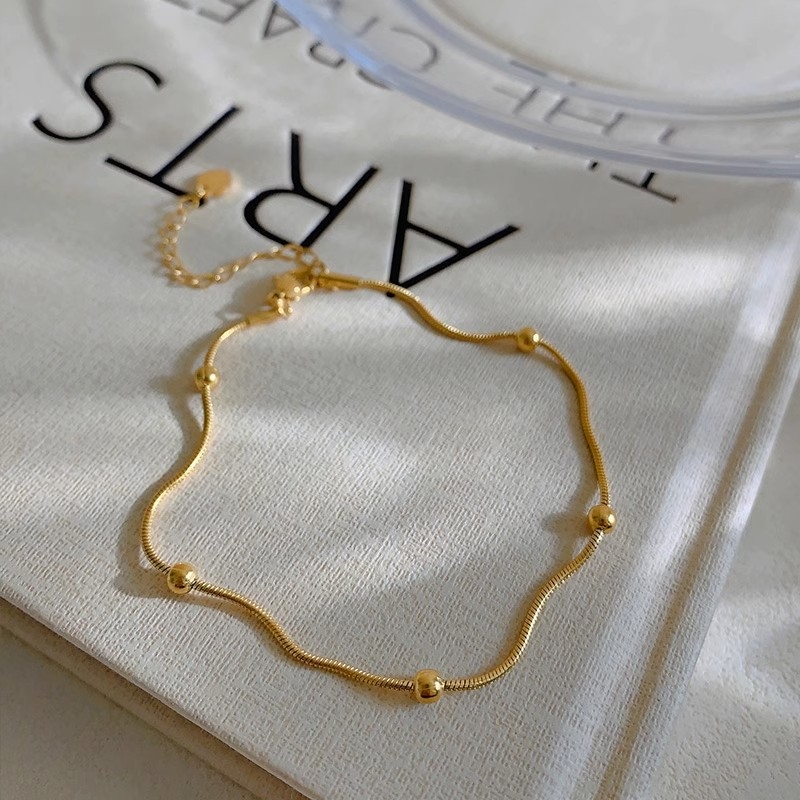 Laimingų karoliukų moteriškas 2023 m. naujas, madingas, seksualus, nišinis, pailgintas čiurnos papuošalas. Aukštos kokybės.