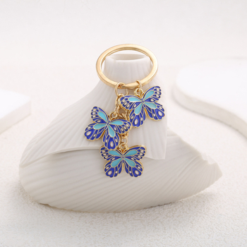 Salda stila eļļas piloša zila tauriņa kulona atslēgu piekariņa aksesuāri rotaslietas maza soma plecu soma kulons labākais draugs daudzpusīgs