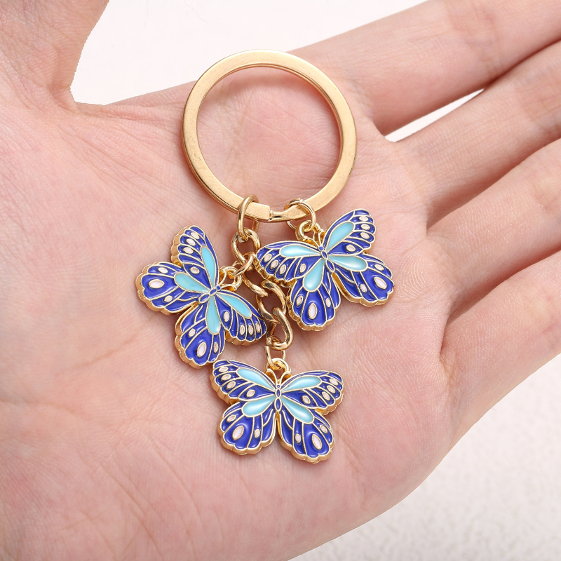 Salda stila eļļas piloša zila tauriņa kulona atslēgu piekariņa aksesuāri rotaslietas maza soma plecu soma kulons labākais draugs daudzpusīgs