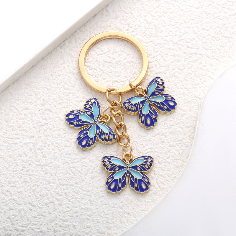 Salda stila eļļas piloša zila tauriņa kulona atslēgu piekariņa aksesuāri rotaslietas maza soma plecu soma kulons labākais draugs daudzpusīgs