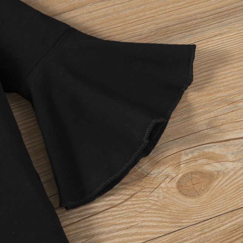 Jesenné novinky pre dievčatá, detský dvojdielny oblek s čiernym zvonovým rukávom a leopardím vzorom, cezhraničný predaj v Európe a Spojených štátoch.