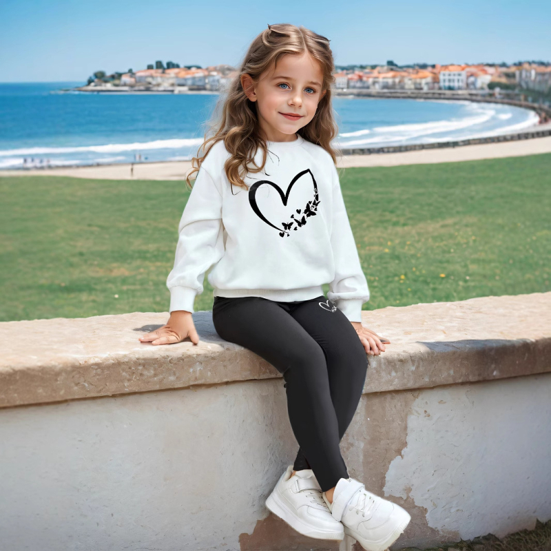 Prekogranična vanjska trgovina INS djevojke djevojke u slobodno vrijeme s tiskom u obliku srca bijeli okrugli izrez džemper i crne hlače jesensko odijelo