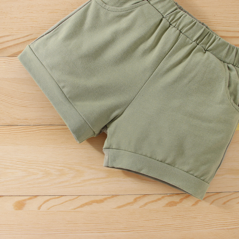 Nové letné chlapčenské biele šortky s krátkym rukávom a potlačou dinosaurov, skladom, doručenie priamo z továrne v jednom kuse