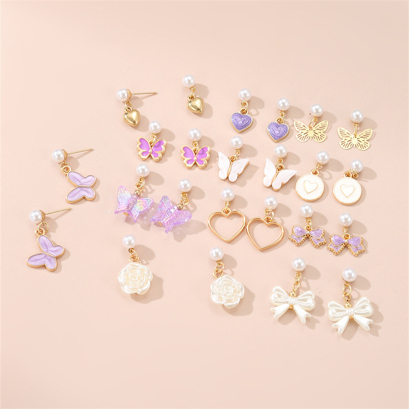 Magusalt tilkuv õli Armastuse liblikalehe ja lille ripats 12 paari kombineeritud ülikonnaga, piiriülesed Yue Shani laste uued kõrvarõngad