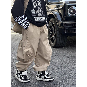 Chlapčenské nohavice Jar a jeseň 2025 Nové pekné detské jarné nohavice Stredné a Veľké detské jarné cargo nohavice Trendy