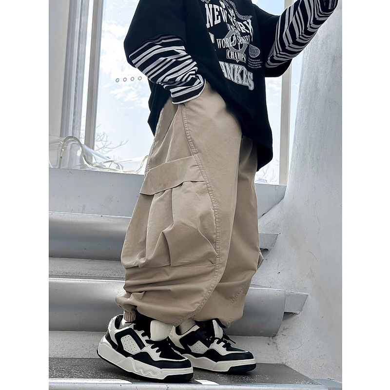 Chlapčenské nohavice Jar a jeseň 2025 Nové pekné detské jarné nohavice Stredné a Veľké detské jarné cargo nohavice Trendy