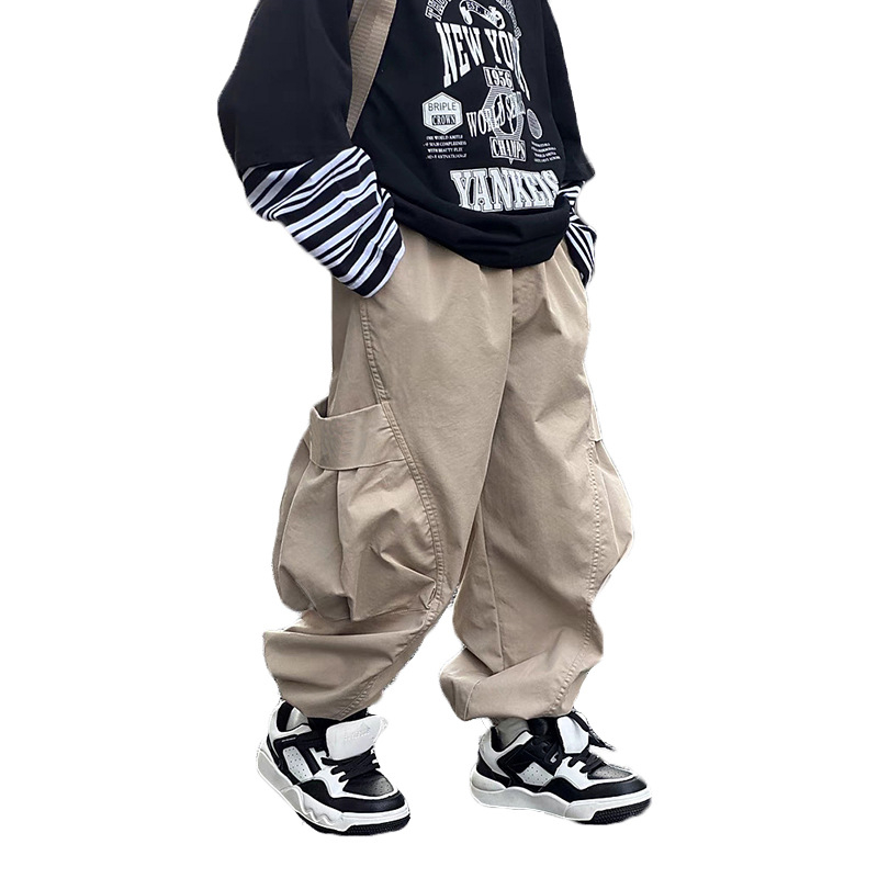 Chlapčenské nohavice Jar a jeseň 2025 Nové pekné detské jarné nohavice Stredné a Veľké detské jarné cargo nohavice Trendy