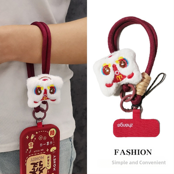 2025 m. prabangios nuotaikos Naujųjų metų raudonas mobiliojo telefono virvelis, mielas pliušinis liūto lėlės pakabukas ant riešo, trumpas