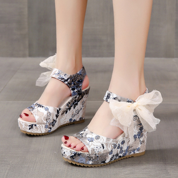 2022 καλοκαίρι νέα ευρωπαϊκή και αμερικανική μόδα εξωτερικού εμπορίου μεγάλου μεγέθους muffin καμουφλάζ ιμάντα σφήνας δαντέλα σανδάλια γυναίκες