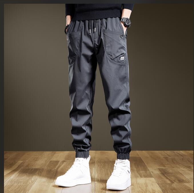 Trojvrstvové nohavice, overaly, pánske trendy značkové kórejské ležérne nohavice, pánske voľné nohavice s viacerými vreckami vo veľkých veľkostiach