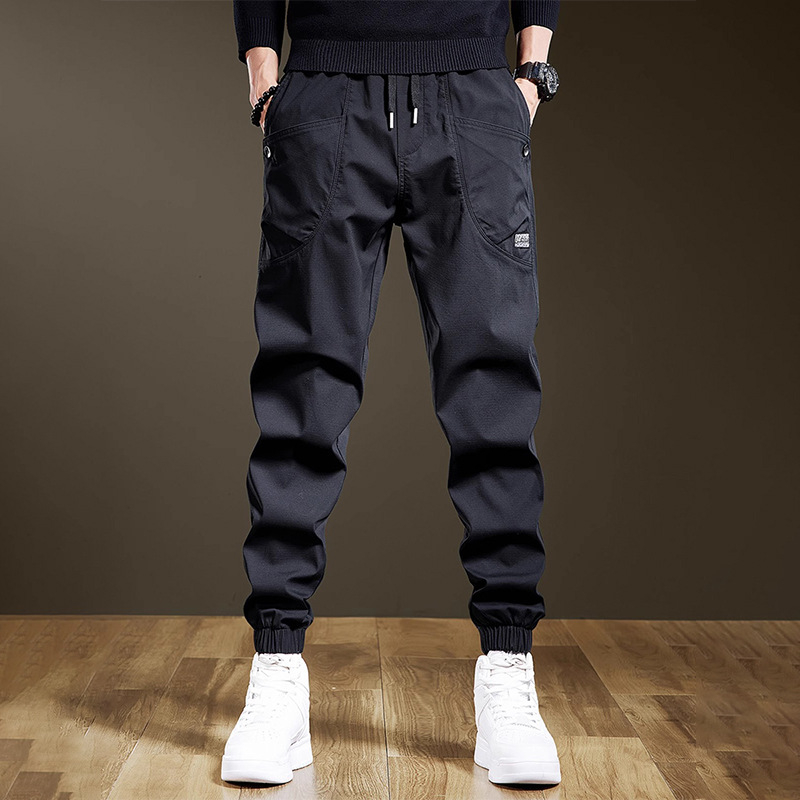 Trojvrstvové nohavice, overaly, pánske trendy značkové kórejské ležérne nohavice, pánske voľné nohavice s viacerými vreckami vo veľkých veľkostiach