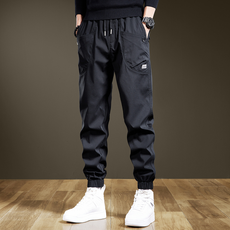 Trojvrstvové nohavice, overaly, pánske trendy značkové kórejské ležérne nohavice, pánske voľné nohavice s viacerými vreckami vo veľkých veľkostiach