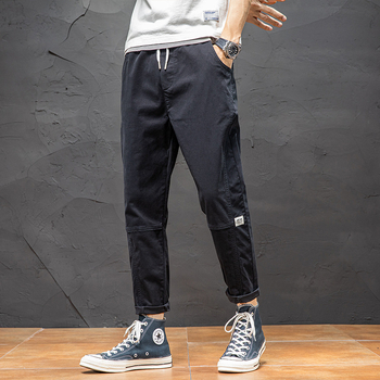 Ležerne hlače za muškarce 2024. Nova ljetna tanka, široka ravna radna odjeća, moderne elastične, svestrane dječje hlače s devet točaka