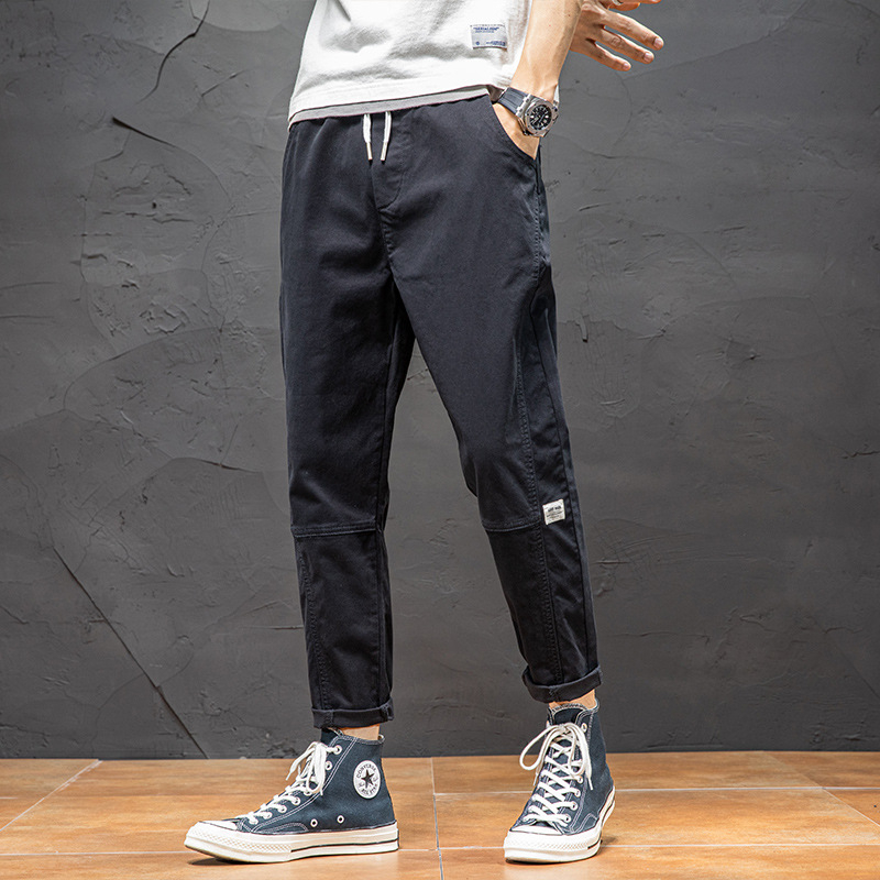 Ležerne hlače za muškarce 2024. Nova ljetna tanka, široka ravna radna odjeća, moderne elastične, svestrane dječje hlače s devet točaka