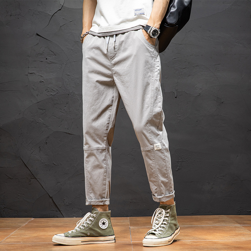 Ležerne hlače za muškarce 2024. Nova ljetna tanka, široka ravna radna odjeća, moderne elastične, svestrane dječje hlače s devet točaka