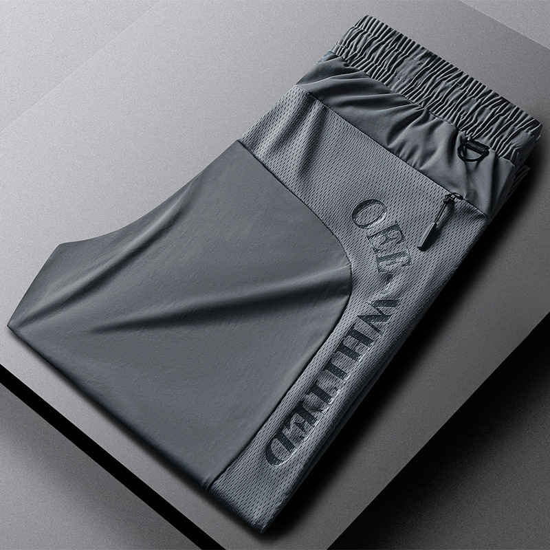 Tvornica izravno M-8X ljetne tanke elastične hlače velike veličine od ledene svile, ljetne muške sportske ležerne hlače s patentnim zatvaračem i džepovima