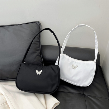 2024. aasta uus lihtne vabaaja käeshoitav väike kott, moodne ja mitmekülgne pendelrännaku õlakott, niši disainiga kaenlaalune kott