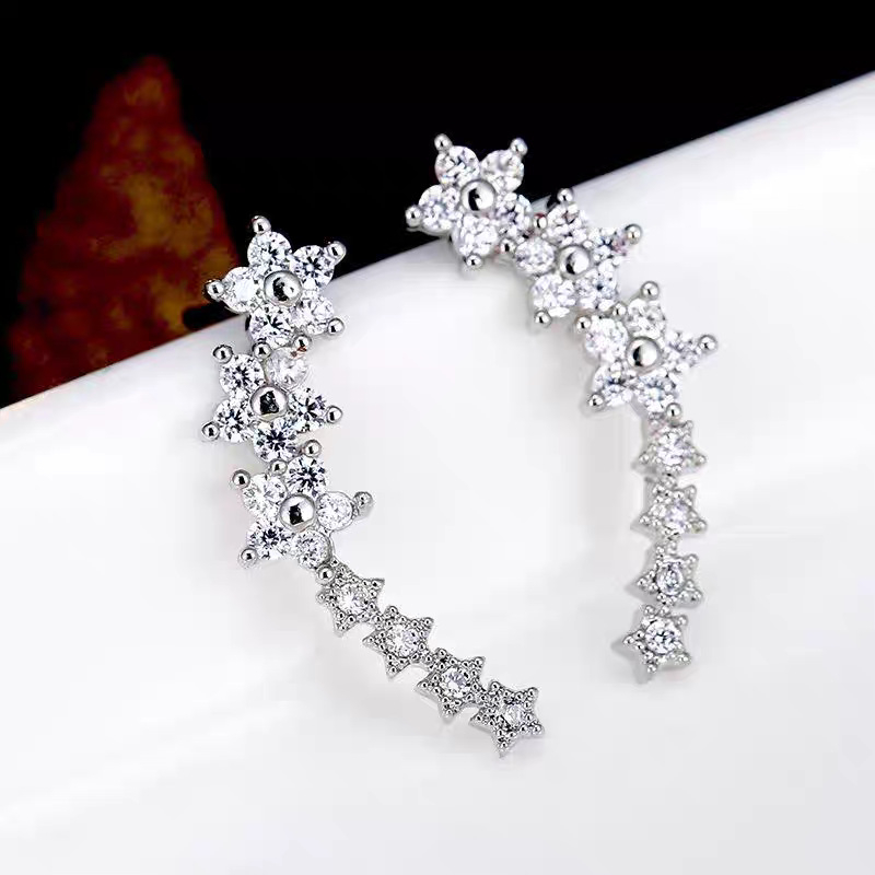 S925 hõbedast lillelise tähekujulised kõrvarõngad, naiste niši disainiga kõrvarõngad, lihtsad külma tuule kõrvarõngad, juuste põlvkond