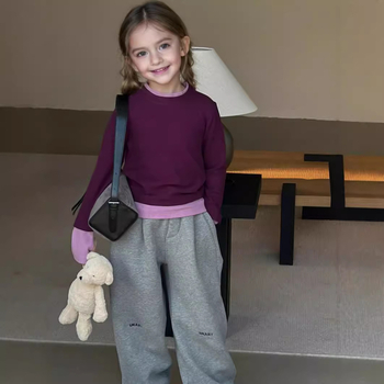 Djevojačka odjeća u korejskom stilu za proljeće 2025. Nova dječja rastezljiva majica dugih rukava s imitacijom tkanine, dvodijelni top s blokovima boja, moderna