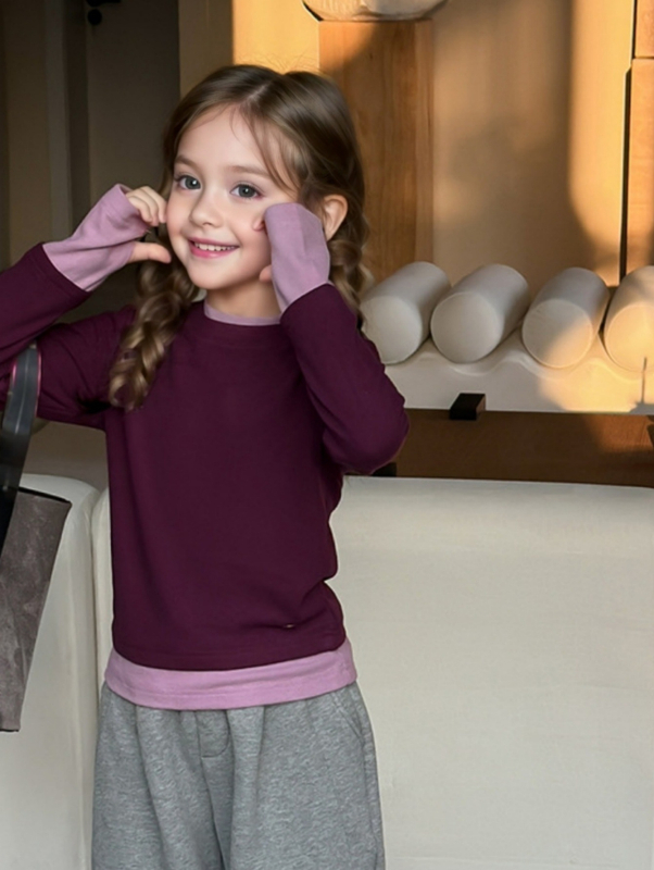 Djevojačka odjeća u korejskom stilu za proljeće 2025. Nova dječja rastezljiva majica dugih rukava s imitacijom tkanine, dvodijelni top s blokovima boja, moderna