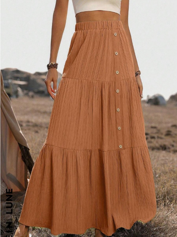 Europska i američka prekogranična proljetna i ljetna nova izvozna ženska odjeća za 2025. godinu, Amazonska modna duga suknja s gumbima za spajanje, veliki rub